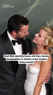 Noah Wyle gleefully kisses wife Sara, leaving photographers in stitches at the Creative Emmy Awards