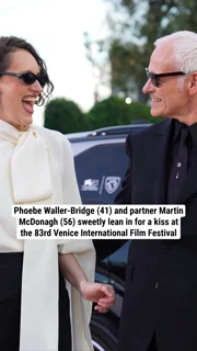 Phoebe Waller-Bridge (41) and partner Martin McDonagh (56) sweetly lean in for a kiss at the 83rd Venice International Film Festival