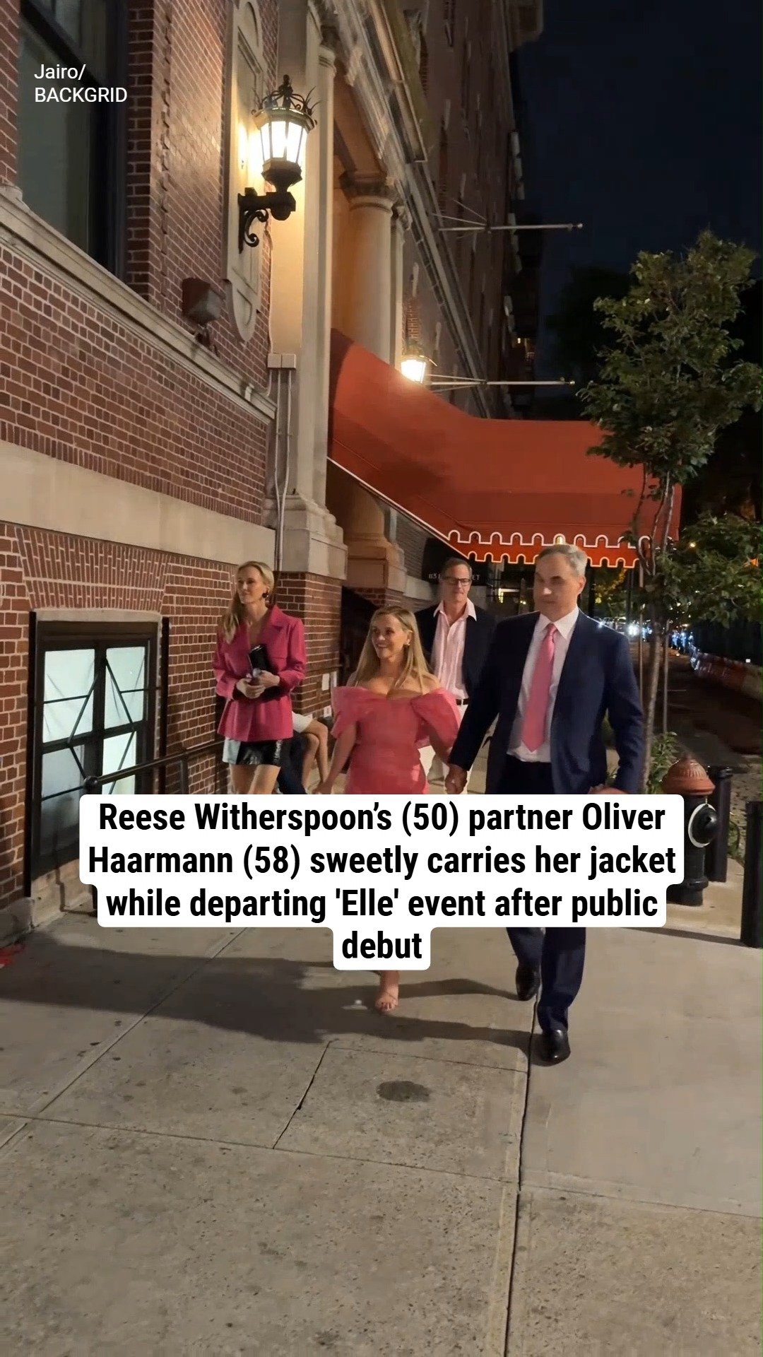 Reese Witherspoon’s (50) partner Oliver Haarmann (58) sweetly carries her jacket while departing 'Elle' event after public debut