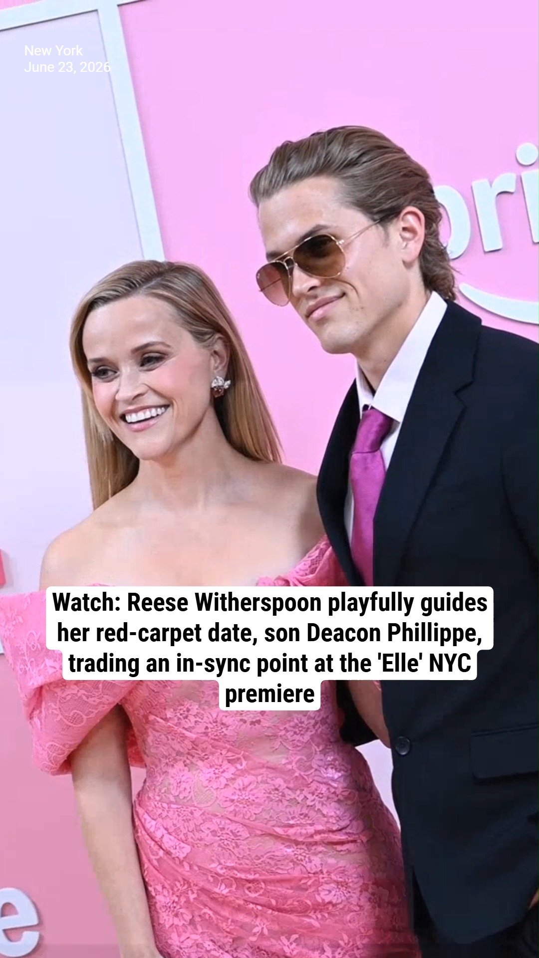 Watch: Reese Witherspoon playfully guides her red-carpet date, son Deacon Phillippe, trading an in-sync point at the 'Elle' NYC premiere