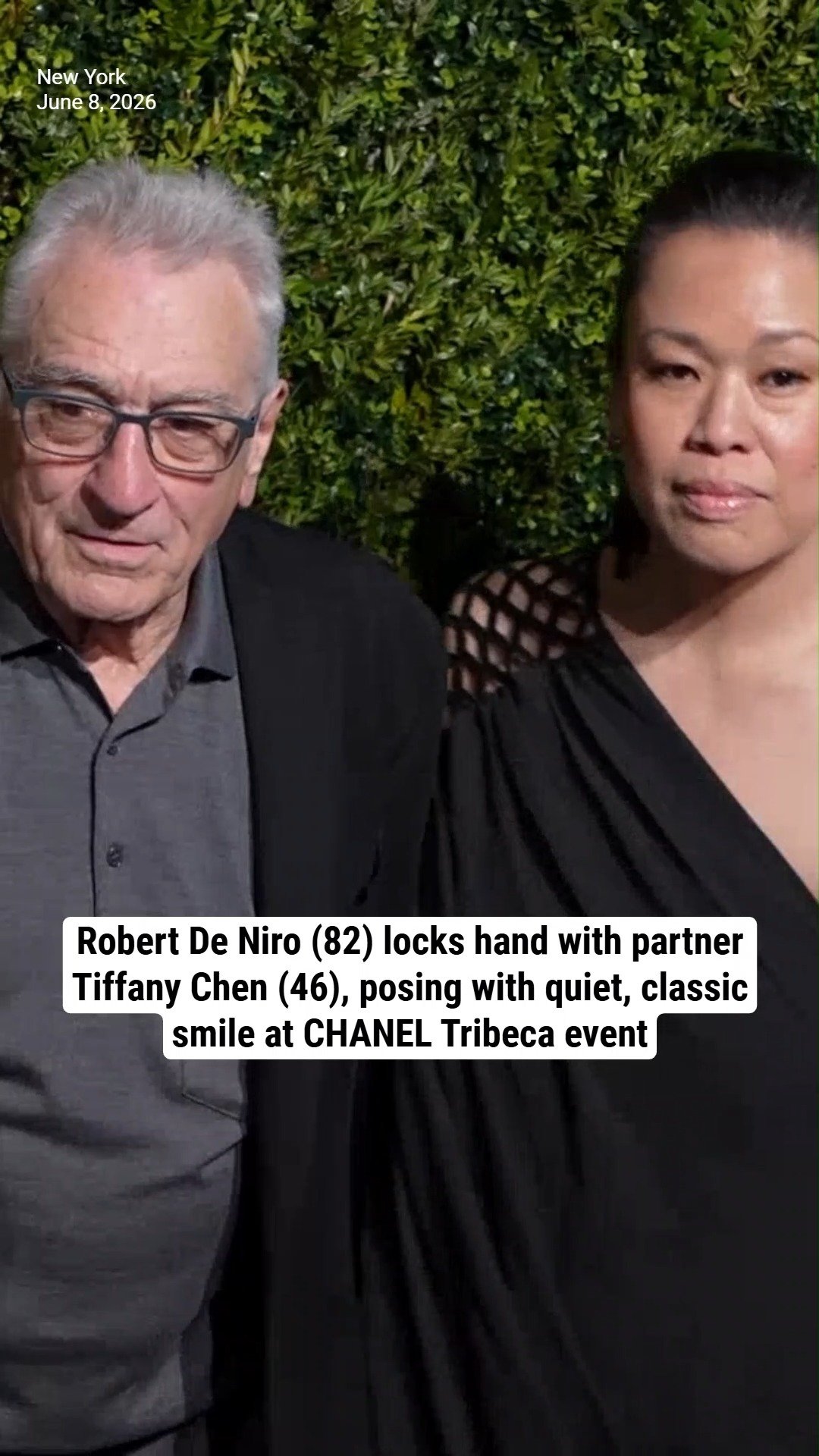 Robert De Niro (82) locks hand with partner Tiffany Chen (46), posing with quiet, classic smile at CHANEL Tribeca event