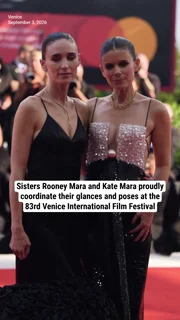 Sisters Rooney Mara and Kate Mara proudly coordinate their glances and poses at the 83rd Venice International Film Festival