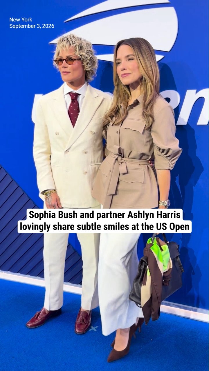Sophia Bush and partner Ashlyn Harris lovingly share subtle smiles at the US Open