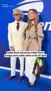 Sophia Bush and partner Ashlyn Harris lovingly share subtle smiles at the US Open
