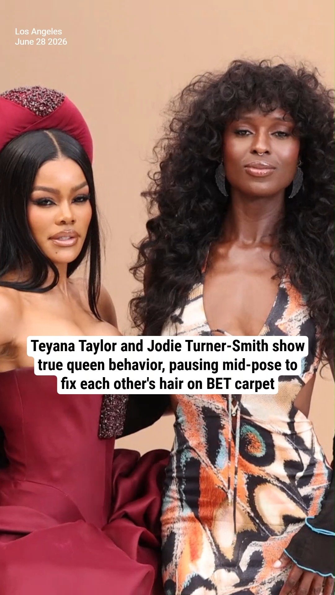Teyana Taylor and Jodie Turner-Smith show true queen behavior, pausing mid-pose to fix each other's hair on BET carpet