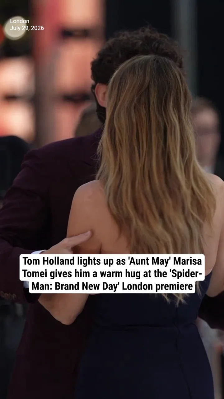 Tom Holland lights up as 'Aunt May' Marisa Tomei gives him a warm hug at the 'Spider-Man: Brand New Day' London premiere