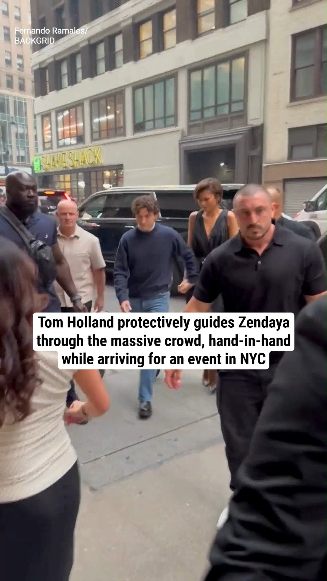 Tom Holland protectively guides Zendaya through the massive crowd, hand-in-hand while arriving for an event in NYC