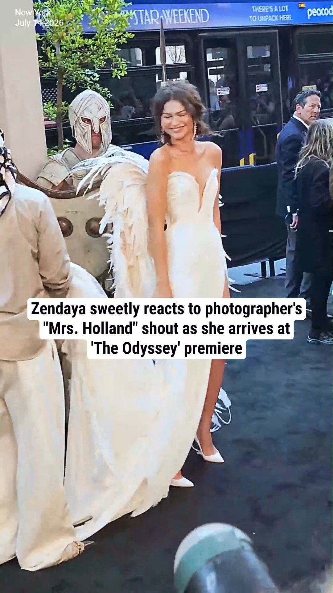 Zendaya sweetly reacts to photographer's "Mrs. Holland" shout as she arrives at 'The Odyssey' premiere