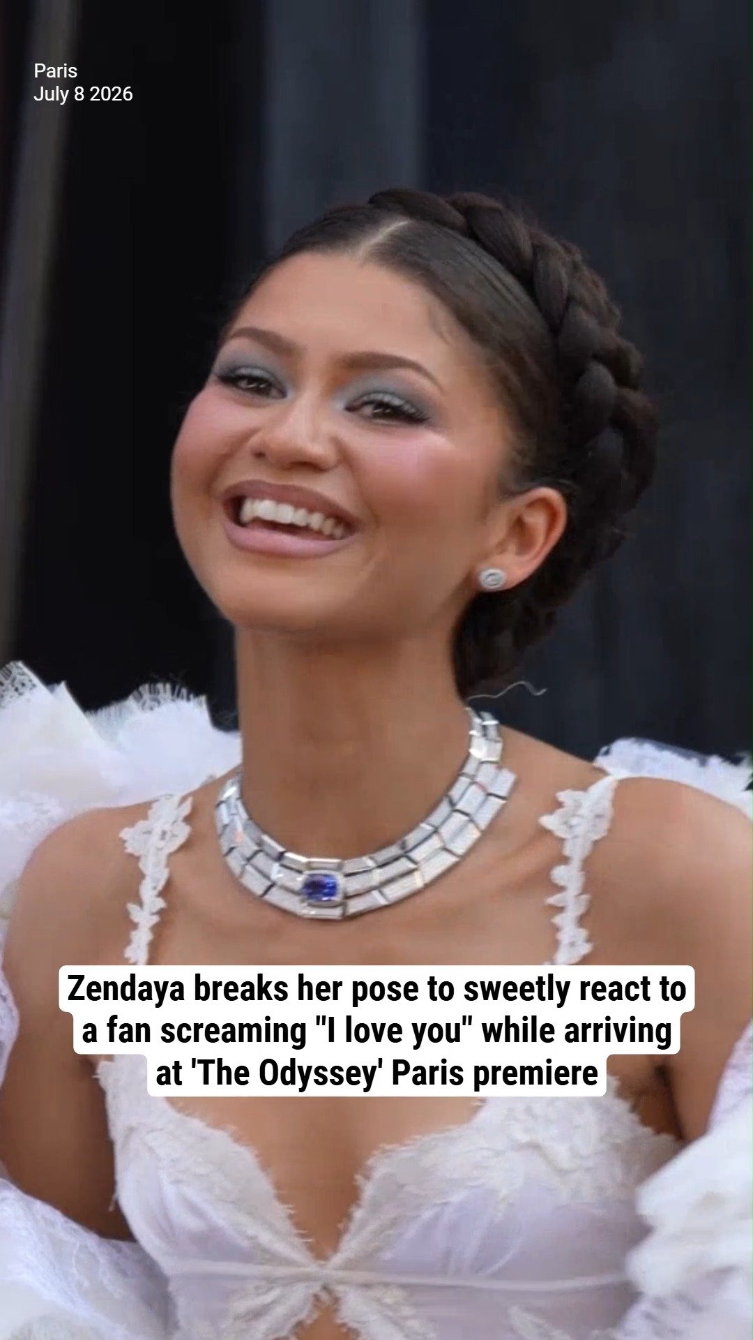 Zendaya breaks her pose to sweetly react to a fan screaming "I love you" while arriving at 'The Odyssey' Paris premiere