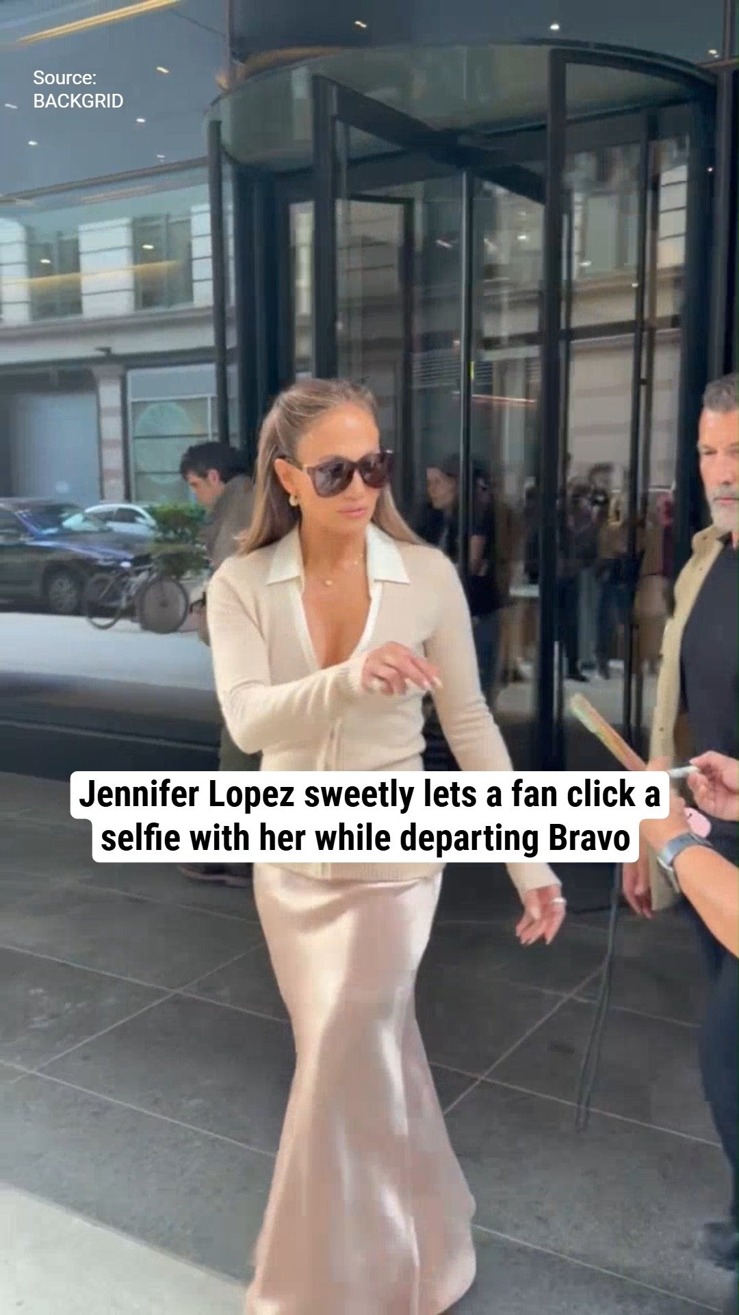 Jennifer Lopez sweetly lets a fan click a selfie with her while departing Bravo
