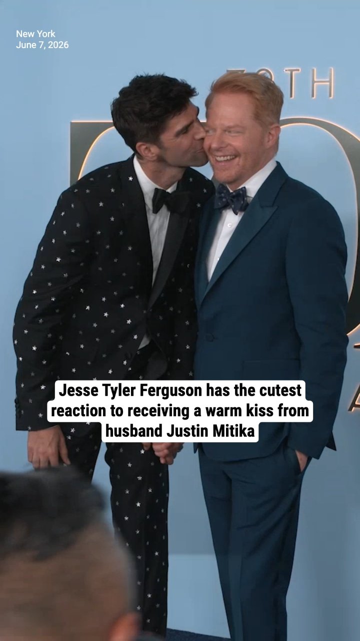 Jesse Tyler Ferguson has the cutest reaction to receiving a warm kiss from husband Justin Mitika
