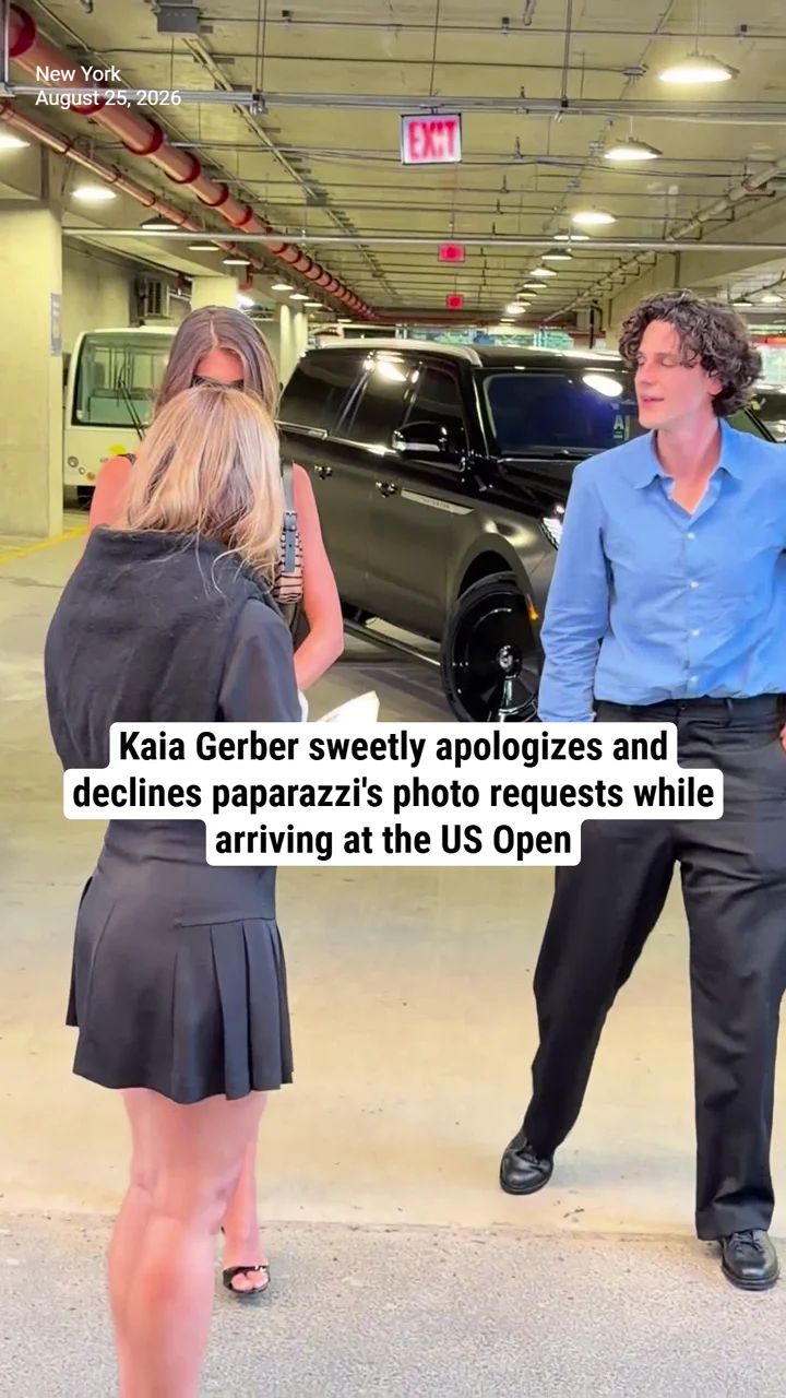 Kaia Gerber sweetly apologizes and declines paparazzi's photo requests while arriving at the US Open