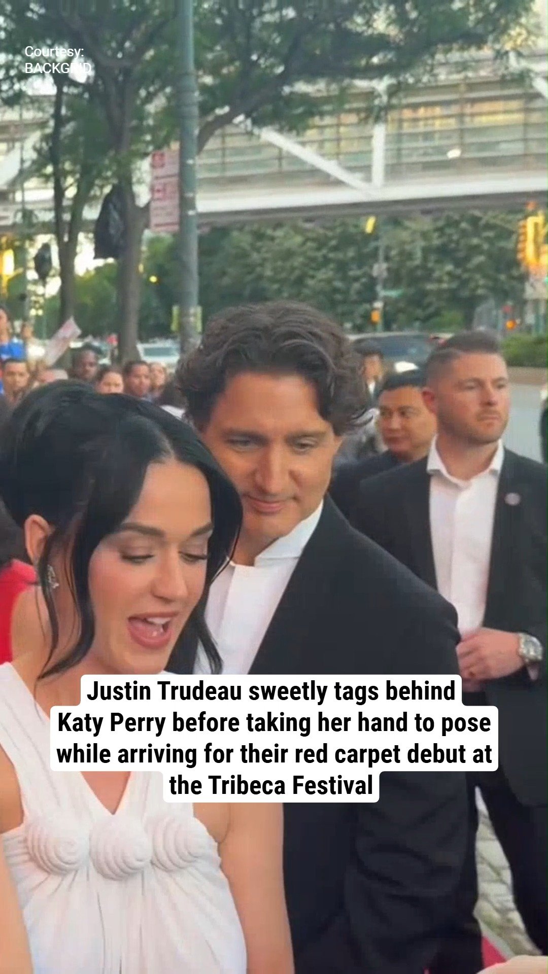 Justin Trudeau sweetly tags behind Katy Perry before taking her hand to pose while arriving for their red carpet debut at the Tribeca Festival