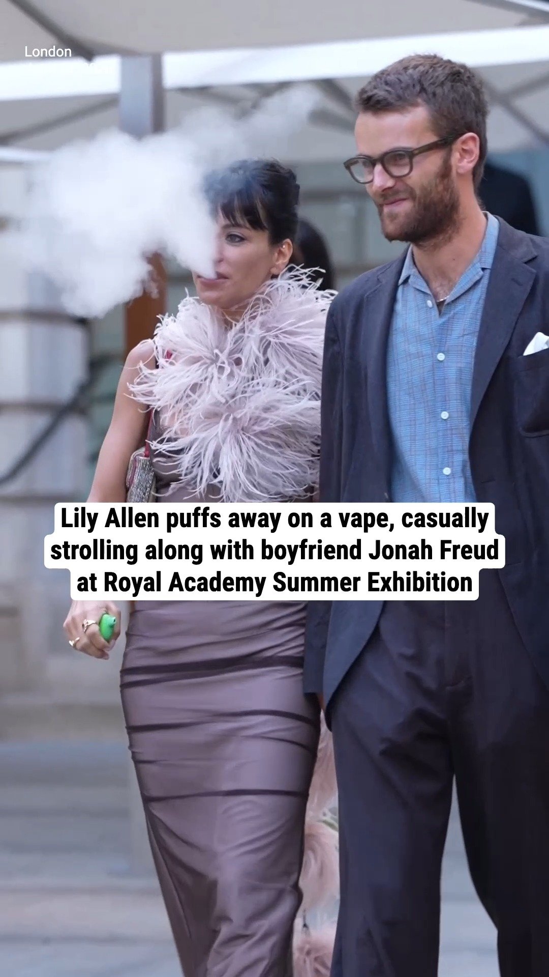 Lily Allen puffs away on a vape, casually strolling along with boyfriend Jonah Freud at Royal Academy Summer Exhibition
