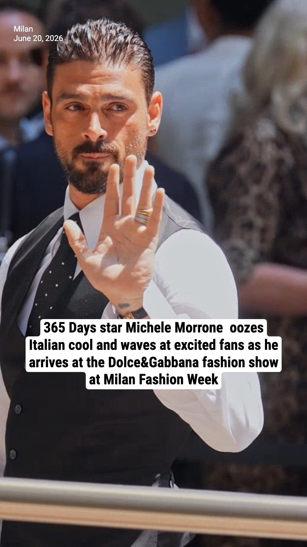 365 Days star Michele Morrone  oozes Italian cool and waves at excited fans as he arrives at the Dolce&Gabbana fashion show at Milan Fashion Week