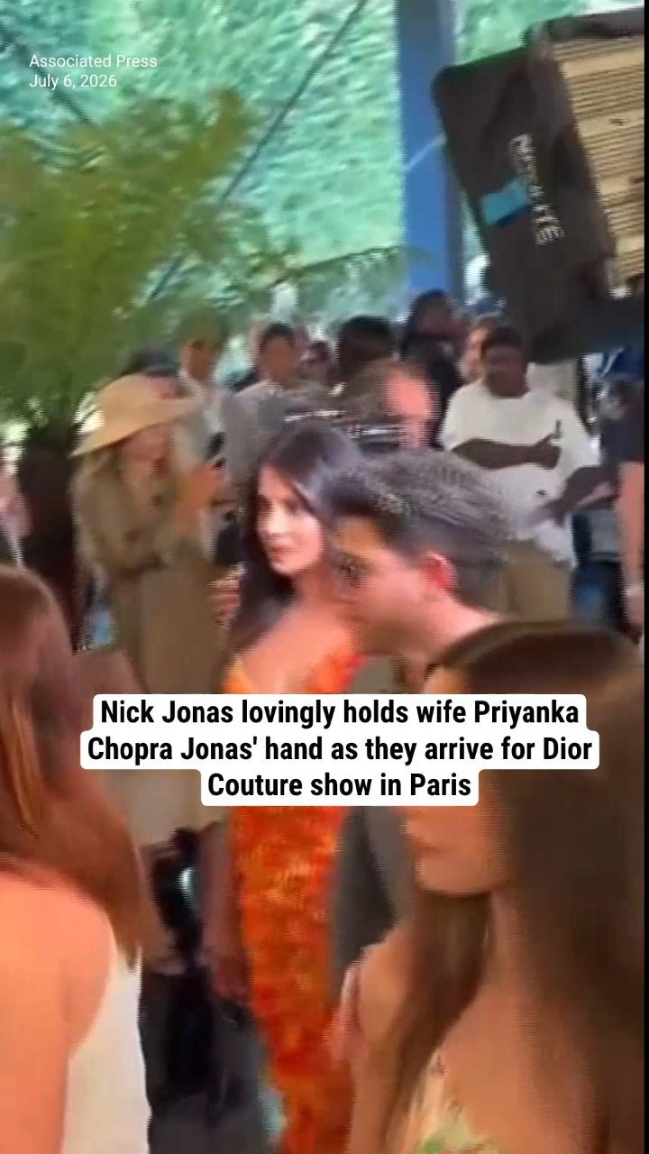 Nick Jonas lovingly holds wife Priyanka Chopra Jonas' hand as they arrive for Dior Couture show in Paris