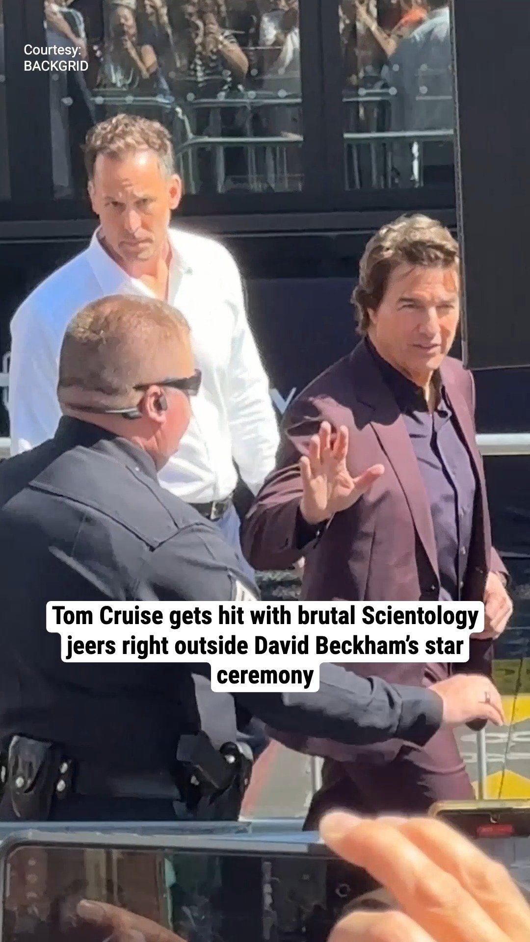 Tom Cruise gets hit with brutal Scientology jeers right outside David Beckham’s star ceremony