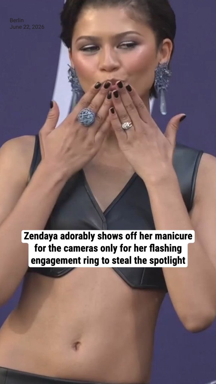 Zendaya adorably shows off her manicure for the cameras only for her flashing engagement ring to steal the spotlight