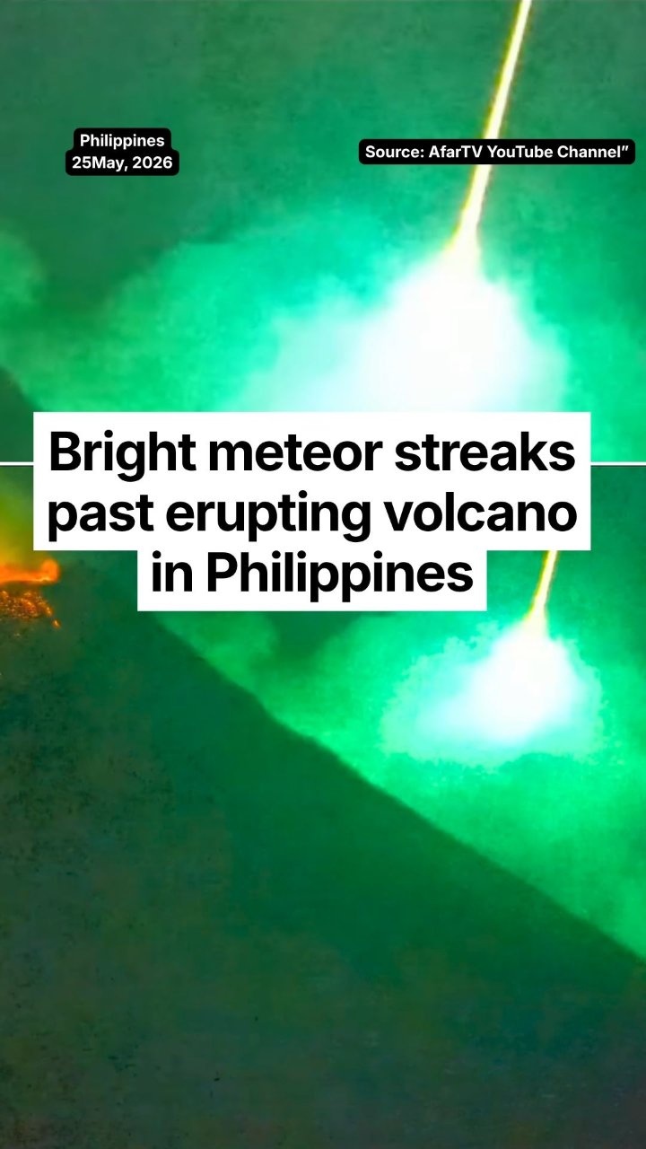 Exact moment bright meteor streaks past erupting volcano in the Philippines
