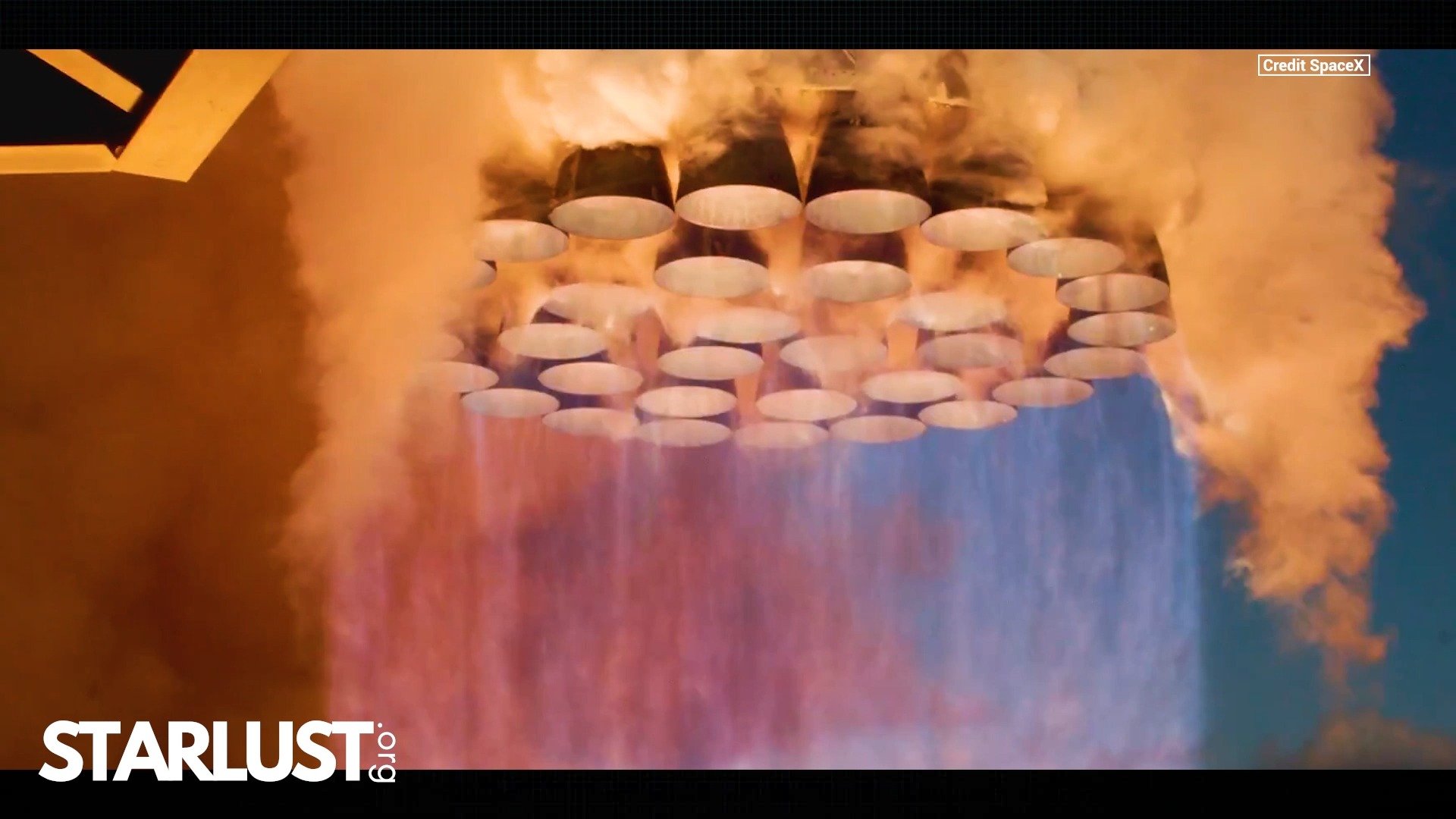 SpaceX shows slow-motion view of all 33 Raptor engines firing during Starship Flight 11